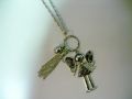 Collar fetiche mu�eca angelito borla chapado en plata mayorista