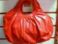 Bolso material calado mano
