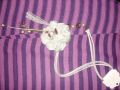 Collar con perlas y flor